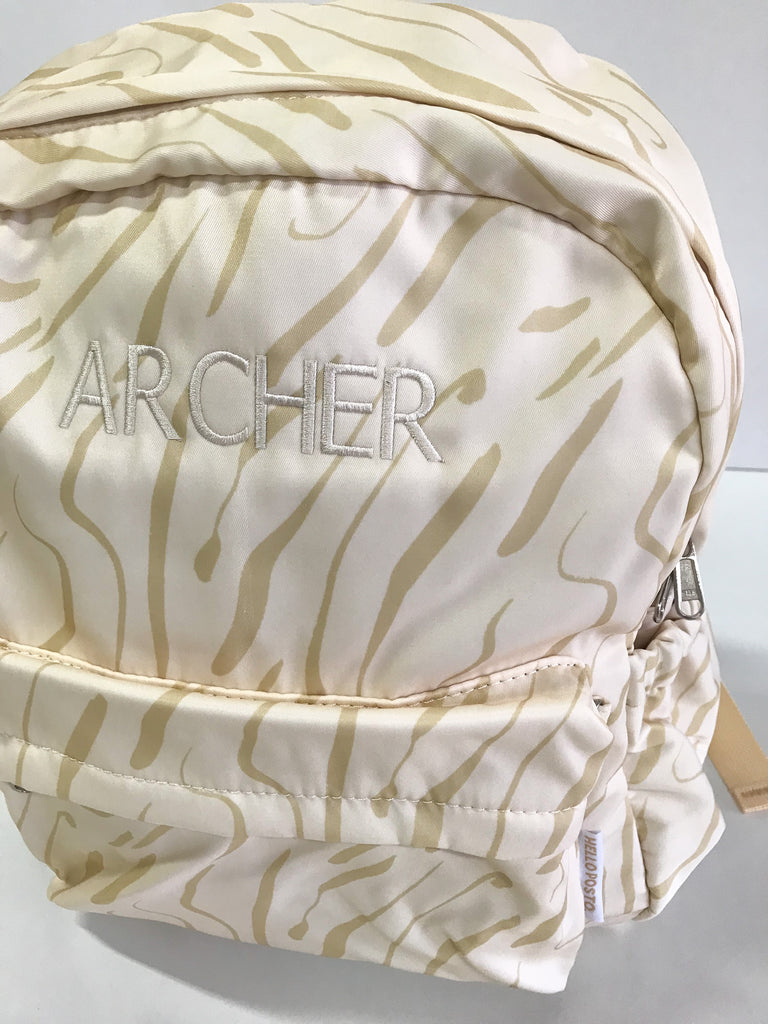 Archer - Cream thread on Wild backpack 